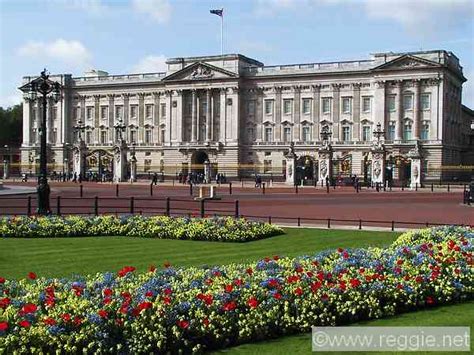 The first and fourth quadrants represent england and contain three gold lions walking (passant) on a red field; Buckingham Palace, London, England, photo