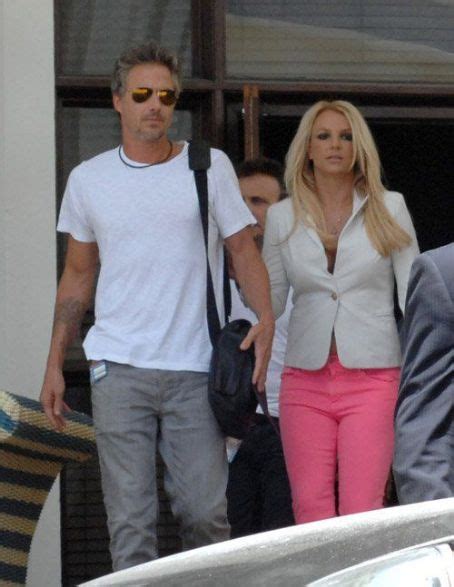 britney spears and her fiance jason trawick leaving their hotel in miami beach for more work on