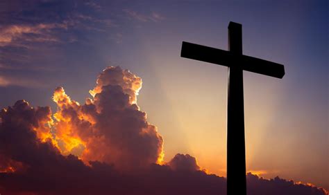 Christian Cross Over Beautiful Sunset Background