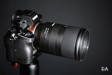 75mm f1.8 at 2m gives 5cm depth of field for a 56mm at 2m to get such a 5cm depth of field you should have a f1 aperture Tamron 28-75mm F/2.8 RXD Review - PHOTONews Magazine