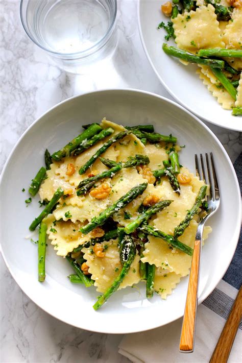 I would stick with something simple, green and cold. Ravioli With Sauteed Asparagus and Walnuts - Green Valley ...