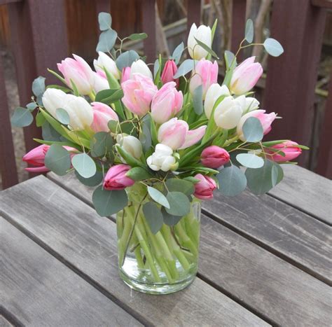 tulip arrangement with silver dollar eucalyptus tulips arrangement flower arrangements