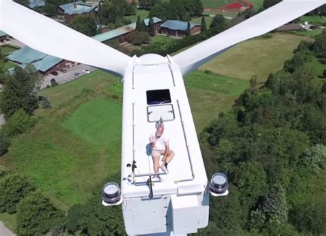 Monk Sunbathing On Wind Turbine Captured By Drone Camera Cbc News