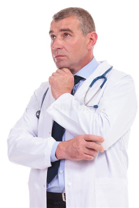 Old Doctor Wondering About The Treatment For His Pacients Stock Image ...