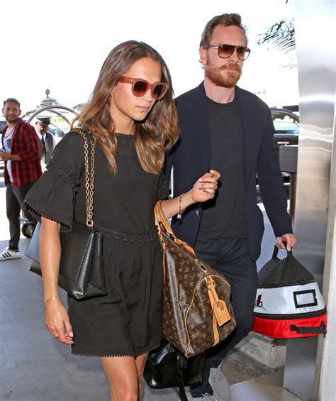 Edition of elle in a new interview. alicia vikander and michael fassbender arriving at the lax ...