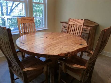 I was curious about using plywood in the construction of a dining table top with thicker solid wood (5/4+) edging. Hand Made Round Ambrosia Maple Dining Table by Haymore Enterprises, Inc | CustomMade.com
