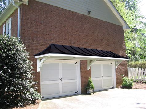 Metal Roof Portico Over Double Garage Doors Designed And Built By
