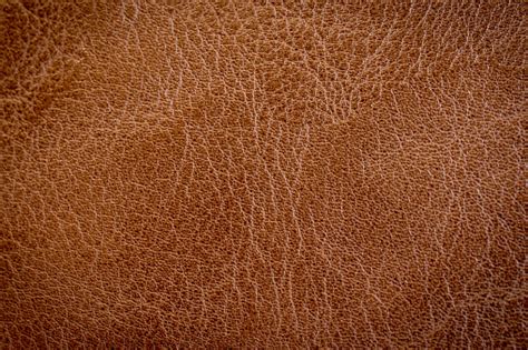 Close Up Brown Leather Texture And Background With Space Stock Photo