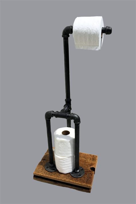 Grab your supplies of pipe fittings as well as mounting screws and wall anchors. Toilet Paper Holder Stand - Reclaimed Art