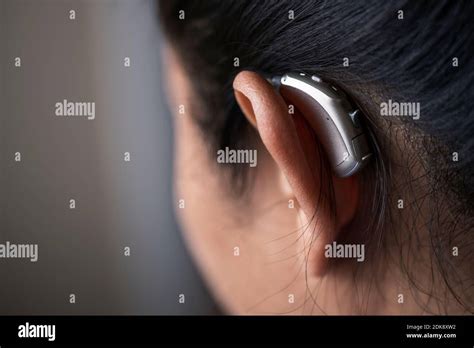 Woman Hearing Aid Hi Res Stock Photography And Images Alamy