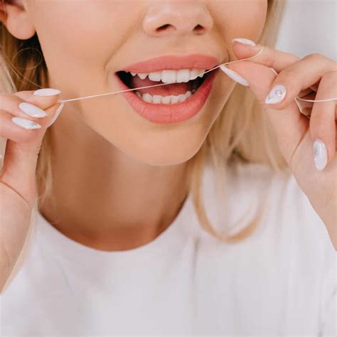 How To Use Dental Floss Correctly Hermes London Dental Clinic