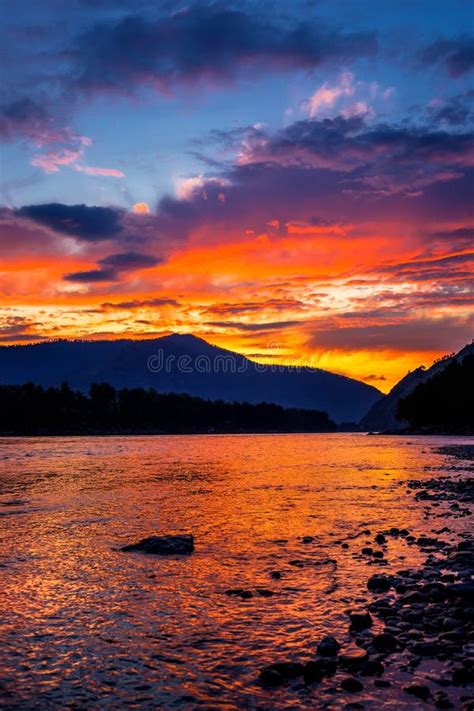 Sunset Over The River Katun River Gorny Altai Siberia Russia Stock