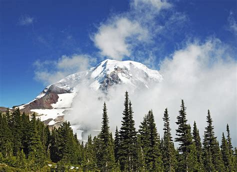 Mount Rainier In Clouds Photograph By Brendan Reals Fine Art America