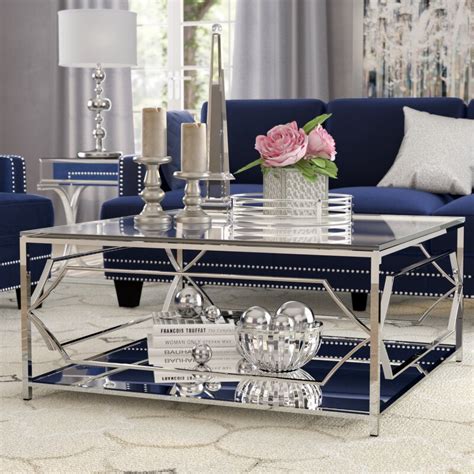 With its clean lines, this brilliant square occasional table showcases a distinctive style for an intriguing look. Willa Arlo Interiors Edward Coffee Table with Storage ...