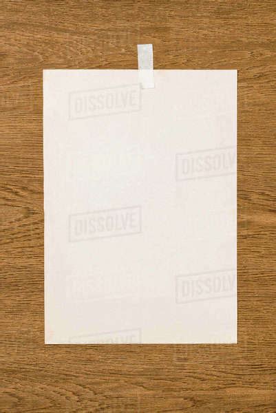 Top View Of Blank White Paper On Wooden Table Stock Photo Dissolve