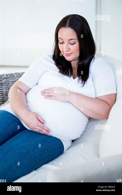 Cute Pregnant Woman Touching Her Belly Stock Photo Alamy