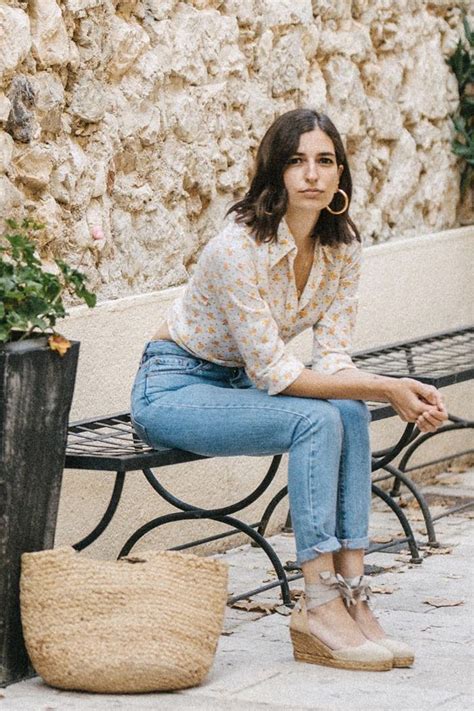 Summer Holiday Outfit Ideas Aria Di Bari In A Floral Shirt Jeans And