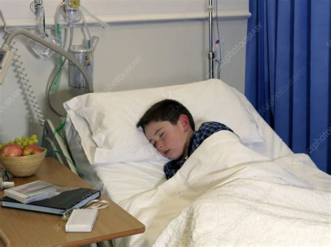 Check spelling or type a new query. Boy sleeping in hospital bed - Stock Image - F005/7542 ...