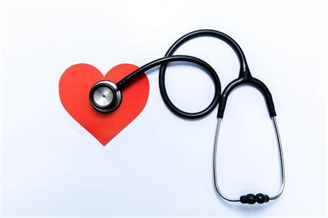 Premium Photo Stethoscope And Heart On White Background
