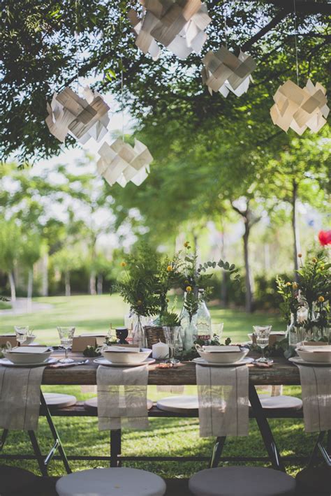 Tape a large plastic tablecloth to the floor and cover a kitchen table or long folding table with another. The Perfect Garden Party · Happy Interior Blog