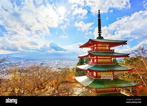 View Of The Japanese Temple In Autumn With Mount Fuji In The Background
