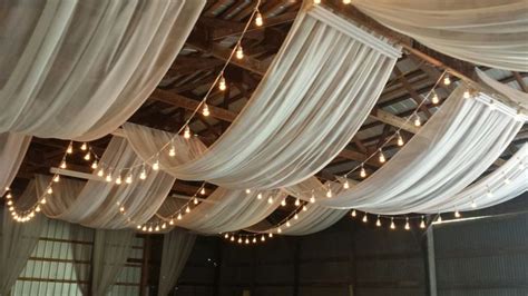Besides good quality brands, you'll also find plenty of discounts when you shop for wedding ceiling drapes during big sales. Ivory ceiling draping with bistro lights | Wedding ceiling ...