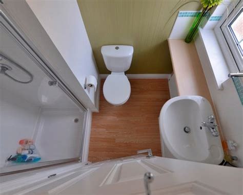 It is possible to buy toilets which are angled to sit into a corner. Tiny Ensuite | Houzz