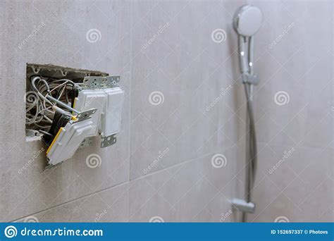 Installation Of Electrical Switch Sockets In The Bathroom Stock Image