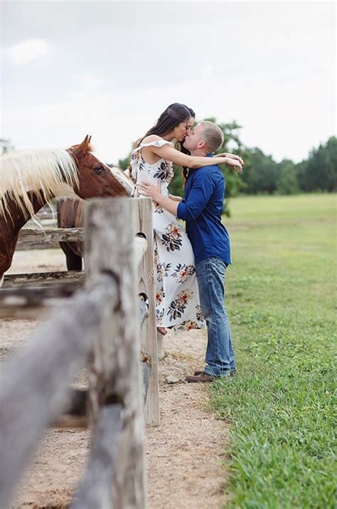 Cozy Country Engagement Session Couple On Fence Southern Bride