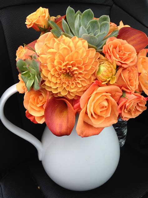 Periodically blooms with orange flowers. Orange Blooms and the Unexpected Succulent | Succulents ...