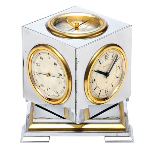 The orbits clock is a uniquely designed clock that contains 3 rotating circles all contained within each other, with the largest circle on the outside representing the hour hand, inside that circle is. AURICOSTE Art Deco Chrome Weather Clock | 1stdibs.com ...