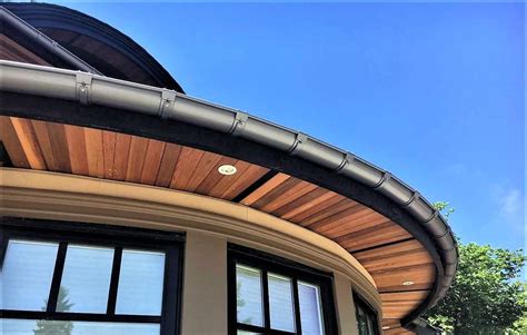 Lindab Rainline Gutters on a curved roof | Gutters, Deck railings ...