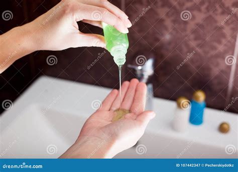 Woman Pours Shampoo Into Her Hand Stock Image Image Of Care Aroma 107442347
