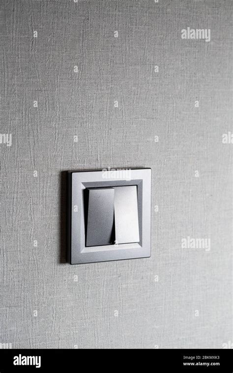 Two Key Switch Gray On The Wall A Plastic Mechanical Switch Light