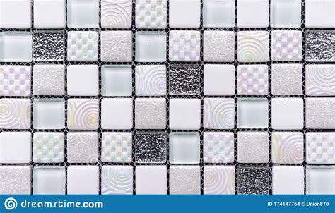 Ceramic Mosaic Tiles With Gray And White Embossed Squares To Decorate
