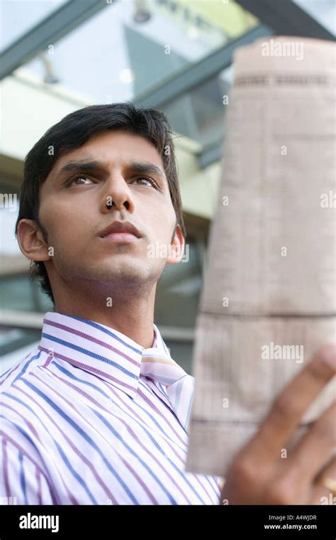 Businessman Reading Newspaper Stock Photo Alamy