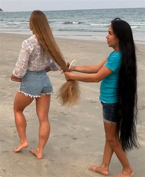 video two rapunzels at the beach long hair styles extra long hair loose hairstyles