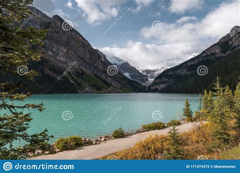 Travel In Autumn On Lake Louise At Banff National Park Stock Photo