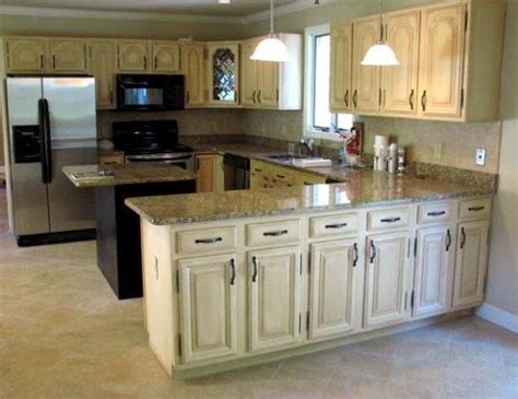 This usually comes in a creamy beige, off white or distressed white finish. Distressed Black Kitchen Cabinets in an Old Look ...