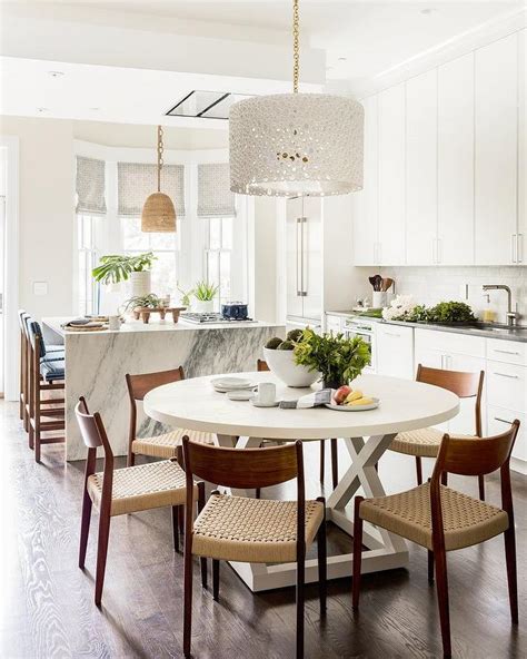 White Drum Chandelier With Round White Dining Table Transitional