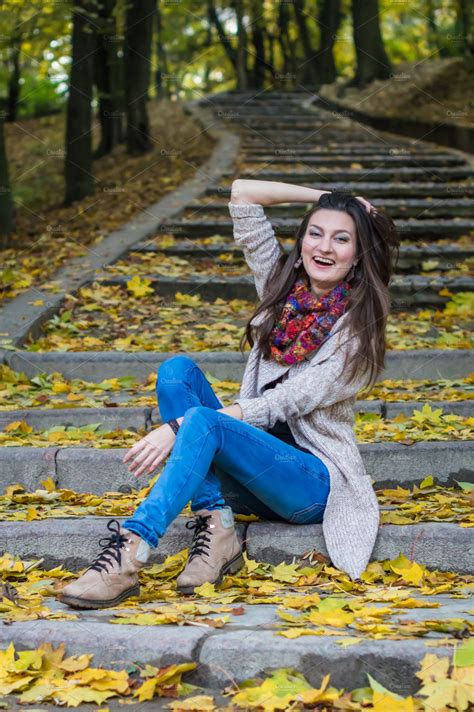 Smiling Girl Sitting On The Stairs Featuring Autumn Beautiful And