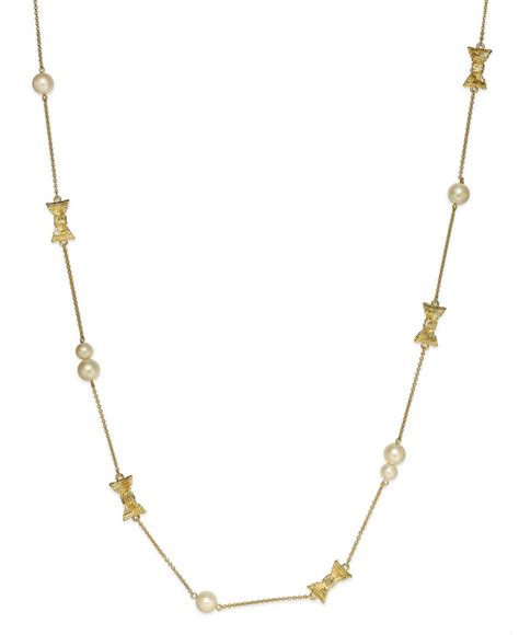 Lyst Kate Spade Gold Tone Bow And Imitation Pearl Long Station
