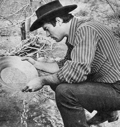 Picture Of Clint Walker S Wife Clint Pans For Precious Gold Ore Washing The Sand Carefully To