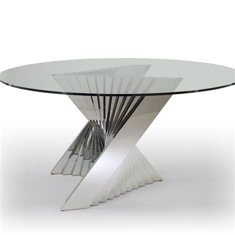 This glass table top is tempered for added strength. 30 Collection of Modern Round Glass Top Dining Tables