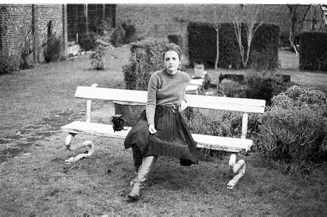 A Portrait Of A Beautiful Woman Relaxing On A Bench Del Colaborador De Stocksy Anna Malgina
