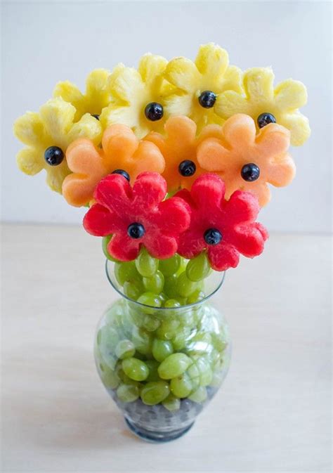 14 Edible Ways To Give Mom Flowers Fruit Creations Food Art Edible Arrangements
