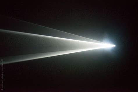 Illuminated Beam Of Light From A Projector By Stocksy Contributor