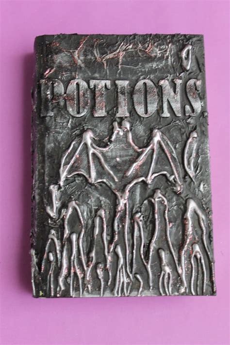 Create spell books to make your bookshelves extra spooky for halloween. DIY Halloween Spell Books | POPSUGAR Smart Living Photo 12