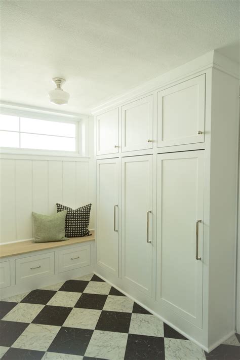 Blue mudroom with floor to ceiling cabinets & beadboard trim doors. Springhill Drive — | Floor to ceiling cabinets, Mudroom ...