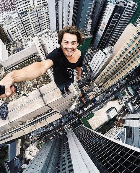 Daredevils Climb To The Top Of Worlds Tallest Towers In Quest For